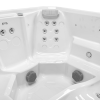 a white hot tub with silver accents