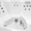 a white jacuzzi with silver buttons