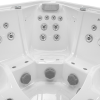 a white hot tub with many holes