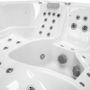 a white hot tub with many holes