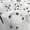 A white hot tub with many different types of buttons
