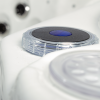 A white hot tub with many different types of buttons