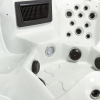 a white jacuzzi with black circles