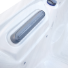 a white hot tub with black knobs