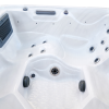 a white hot tub with black knobs