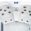 a white hot tub with many round holes