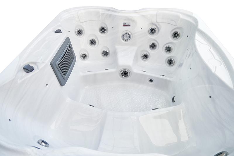 a white hot tub with many holes