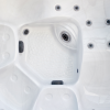 a white hot tub with many holes